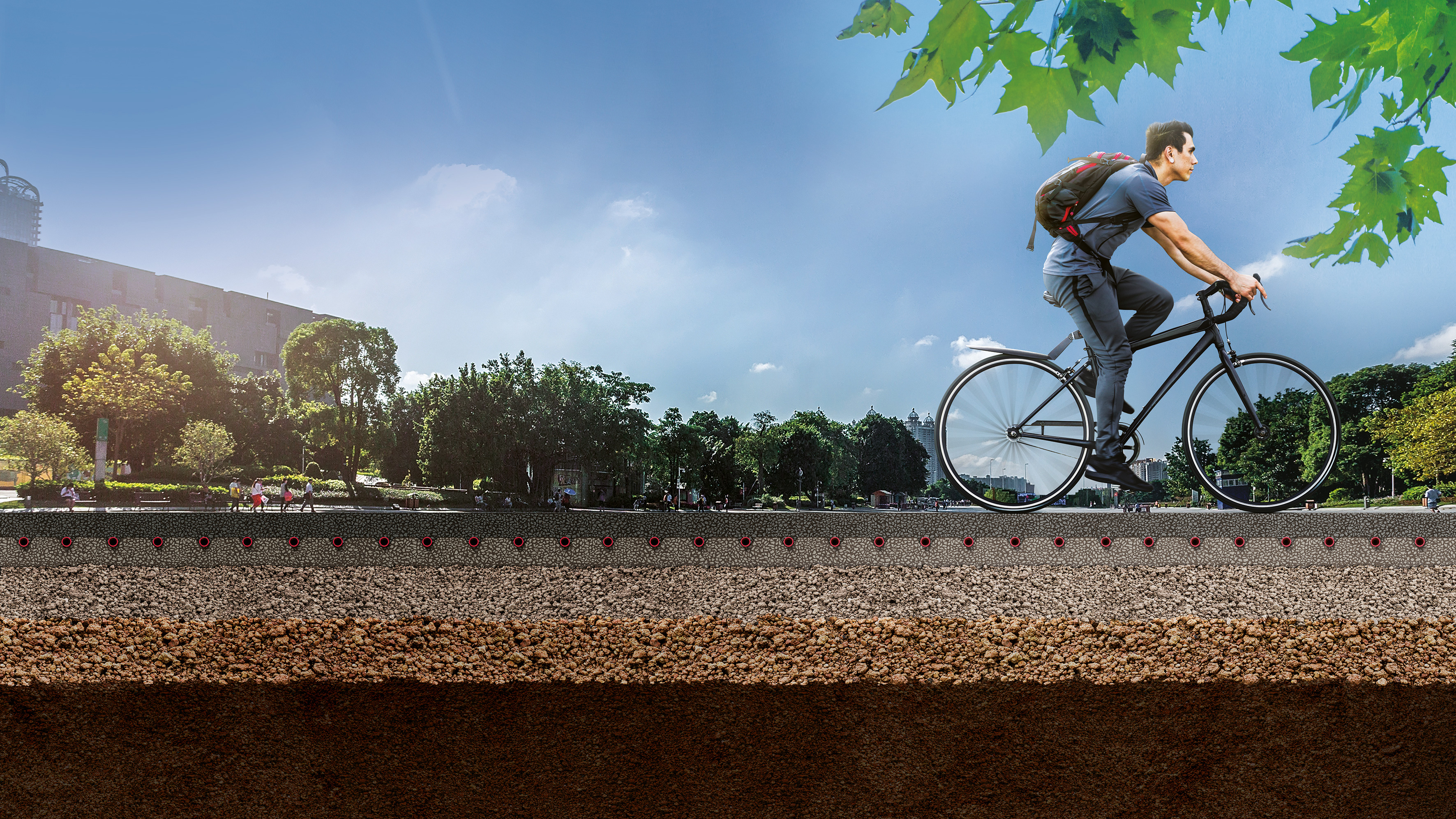 Fahrradfahrer auf einer Straße, die einzelnen Schichten des Straßenaufbaus sind sichtbar.